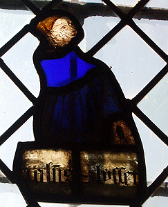 Fragment of stained glass in the south aisle west window May 2011